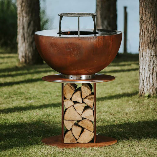  Runder Rostfarbener Gartengrill Aus Stahl Mit Fach Für Holz - Masuria - Stilo Grill